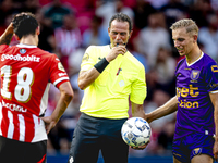 Referee Bas Nijhuis and Go Ahead Eagles player Finn Stokkers during the match between PSV and Go Ahead Eagles at the Philips Stadium for the...