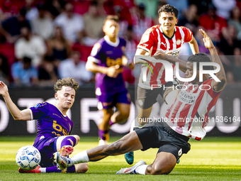 Go Ahead Eagles player Jakob Breum and PSV player Ryan Flamingo during the match PSV vs. Go Ahead Eagles at the Philips Stadium for the Dutc...