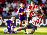 Go Ahead Eagles player Jakob Breum and PSV player Ryan Flamingo during the match PSV vs. Go Ahead Eagles at the Philips Stadium for the Dutc...