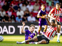 Go Ahead Eagles player Jakob Breum and PSV player Ryan Flamingo during the match PSV vs. Go Ahead Eagles at the Philips Stadium for the Dutc...