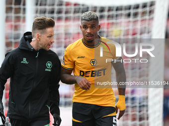 Mario Lemina of Wolverhampton Wanderers leaves the pitch after suffering an injury during the Premier League match between Nottingham Forest...