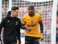 Mario Lemina of Wolverhampton Wanderers leaves the pitch after suffering an injury during the Premier League match between Nottingham Forest...