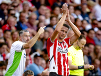 PSV player Luuk de Jong gets injured and leaves the pitch during the match PSV vs. Go Ahead Eagles at the Philips Stadium for the Dutch Ered...