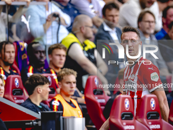 PSV player Luuk de Jong gets injured and leaves the pitch during the match PSV vs. Go Ahead Eagles at the Philips Stadium for the Dutch Ered...