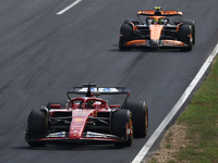 Charles Leclerc of Ferrari and Lando Norris of McLaren during the Formula 1 Italian Grand Prix at Autodromo Nazionale di Monza in Monza, Ita...