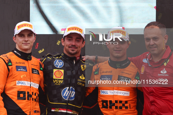 Oscar Piastri of McLaren, Charles Leclerc of Ferrari and Lando Norris of McLaren after the Formula 1 Italian Grand Prix at Autodromo Naziona...