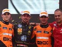 Oscar Piastri of McLaren, Charles Leclerc of Ferrari and Lando Norris of McLaren after the Formula 1 Italian Grand Prix at Autodromo Naziona...