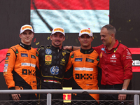 Oscar Piastri of McLaren, Charles Leclerc of Ferrari and Lando Norris of McLaren after the Formula 1 Italian Grand Prix at Autodromo Naziona...