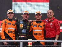 Oscar Piastri of McLaren, Charles Leclerc of Ferrari and Lando Norris of McLaren after the Formula 1 Italian Grand Prix at Autodromo Naziona...