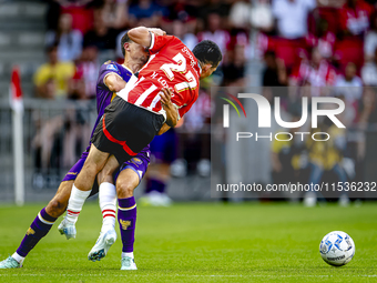 Go Ahead Eagles player Mats Deijl and PSV player Hirving Lozano during the match PSV vs. Go Ahead Eagles at the Philips Stadium for the Dutc...