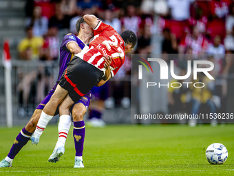 Go Ahead Eagles player Mats Deijl and PSV player Hirving Lozano during the match PSV vs. Go Ahead Eagles at the Philips Stadium for the Dutc...