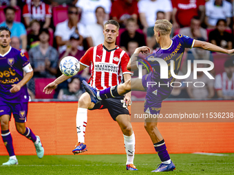 PSV player Joey Veerman and Go Ahead Eagles player Finn Stokkers during the match PSV vs. Go Ahead Eagles at the Philips Stadium for the Dut...