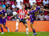 PSV player Joey Veerman and Go Ahead Eagles player Finn Stokkers during the match PSV vs. Go Ahead Eagles at the Philips Stadium for the Dut...