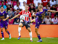 PSV player Joey Veerman and Go Ahead Eagles player Finn Stokkers during the match PSV vs. Go Ahead Eagles at the Philips Stadium for the Dut...