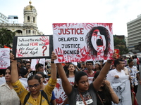 Citizens take part in a protest rally against the rape and murder of a PGT woman doctor at Government-run R G Kar Medical College & Hospital...