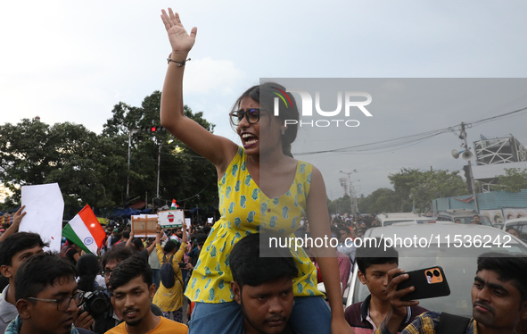 Citizens take part in a protest rally against the rape and murder of a PGT woman doctor at Government-run R G Kar Medical College & Hospital...