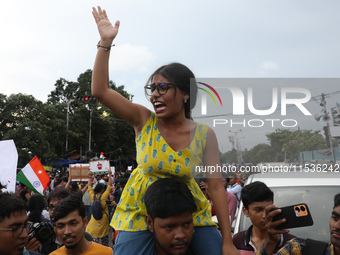 Citizens take part in a protest rally against the rape and murder of a PGT woman doctor at Government-run R G Kar Medical College & Hospital...