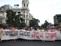 Citizens take part in a protest rally against the rape and murder of a PGT woman doctor at Government-run R G Kar Medical College & Hospital...