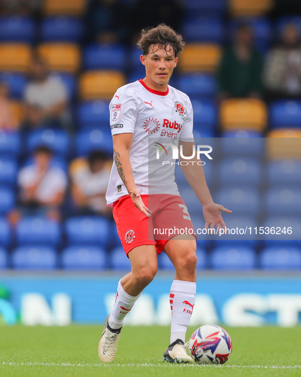 Kayden Huges of Fleetwood Town during the Sky Bet League 2 match between AFC Wimbledon and Fleetwood Town at Plough Lane in Wimbledon, Engla...