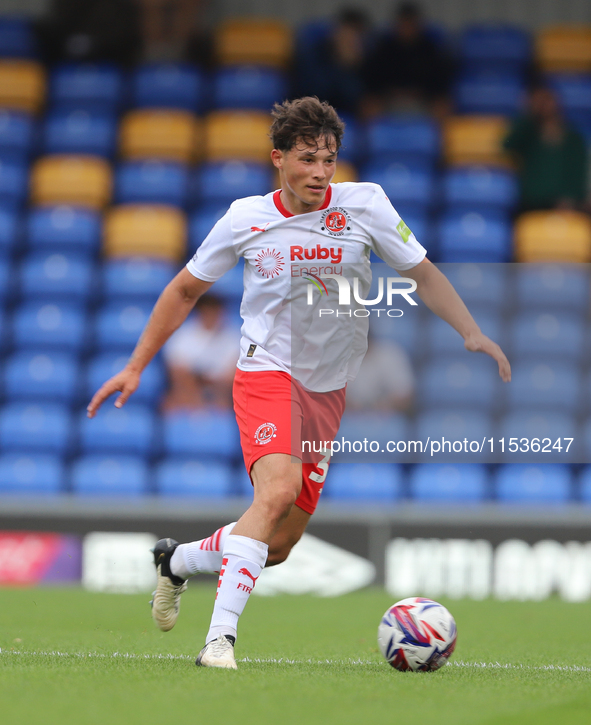 Fleetwood Town player Jayden Huges with the ball during the Sky Bet League 2 match between AFC Wimbledon and Fleetwood Town at Plough Lane i...