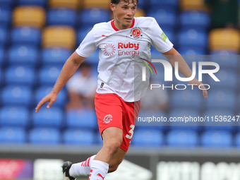 Fleetwood Town player Jayden Huges with the ball during the Sky Bet League 2 match between AFC Wimbledon and Fleetwood Town at Plough Lane i...