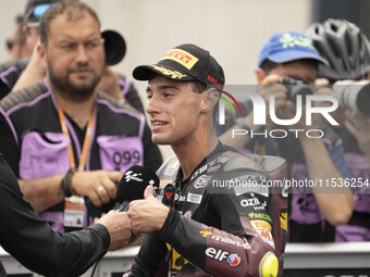 Arbilino Tony, number 14, from the Elf Marc VDS Racing Team, rides a KALEX during the Moto2 Grand Prix race at the Moto Grand Prix GoPro of...