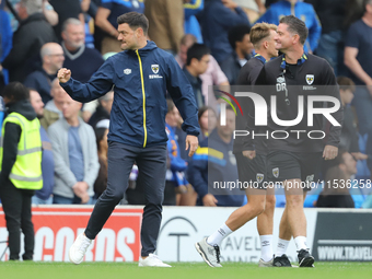 AFC Wimbledon manager Johnnie Jackson celebrates the win after the Sky Bet League 2 match between AFC Wimbledon and Fleetwood Town at Plough...