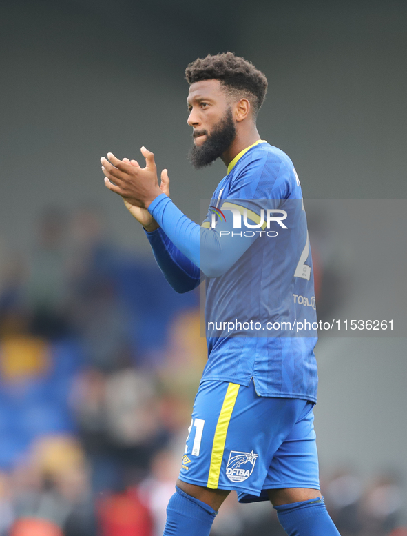 AFC Wimbledon player Myles Hippolyte celebrates the win after the Sky Bet League 2 match between AFC Wimbledon and Fleetwood Town at Plough...