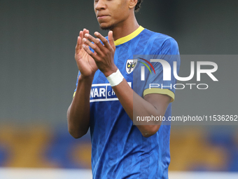 AFC Wimbledon player Alistair Smith claps for the fans after the Sky Bet League 2 match between AFC Wimbledon and Fleetwood Town at Plough L...