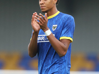 AFC Wimbledon player Alistair Smith claps for the fans after the Sky Bet League 2 match between AFC Wimbledon and Fleetwood Town at Plough L...