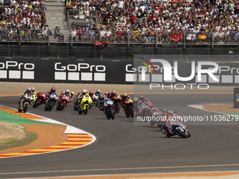 The MotoGP race starts during the Moto Grand Prix GoPro of Aragon Grand Prix race on Sunday at the Motorland circuit in Alcaniz, Spain, on S...