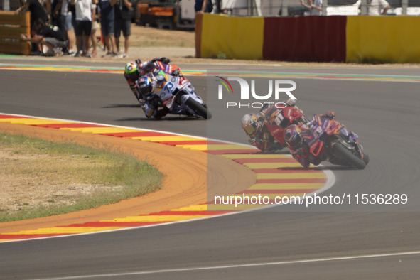 Jorge Martin (89, Spa-Pramac Racing Ducati), Pedro Acosta (31, Spa-GASGAS Factory Racing), and Alex Marquez (73, Spa-Gresini Racing Ducati)...