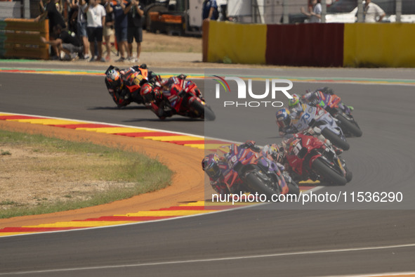 Jorge Martin (89, Spa-Pramac Racing Ducati), Pedro Acosta (31, Spa-GASGAS Factory Racing), and Alex Marquez (73, Spa-Gresini Racing Ducati)...