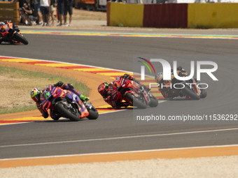 Franco Morbidelli (Ita-Pramac Racing Ducati), Francesco Bagnaia (Ita-Ducati Lenovo Team), and Brad Binder (Saf-Red Bull KTM Factory Racing)...