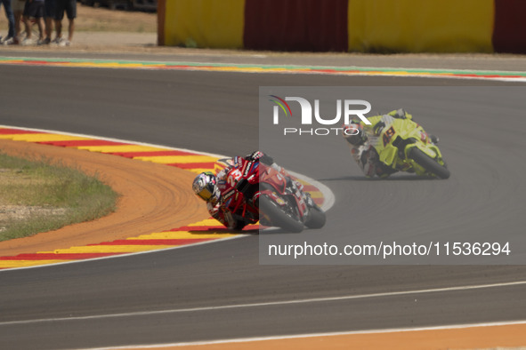 Enea Bastianini (Ita-Ducati Lenovo Team) and Fabio Di Giannantonio (Ita-VR46 Team Ducati) participate in the Moto Grand Prix GoPro of Aragon...