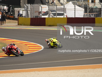 Enea Bastianini (Ita-Ducati Lenovo Team) and Fabio Di Giannantonio (Ita-VR46 Team Ducati) participate in the Moto Grand Prix GoPro of Aragon...