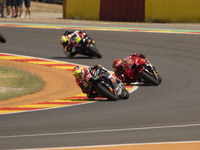 Aleix Espargaro (41) of Aprilia Racing and Augusto Fernandez (37) of GASGAS Factory Racing during the Moto Grand Prix GoPro of Aragon Grand...