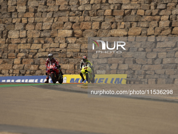 Enea Bastianini (Ita-Ducati Lenovo Team) and Fabio Di Giannantonio (Ita-VR46 Team Ducati) participate in the Moto Grand Prix GoPro of Aragon...