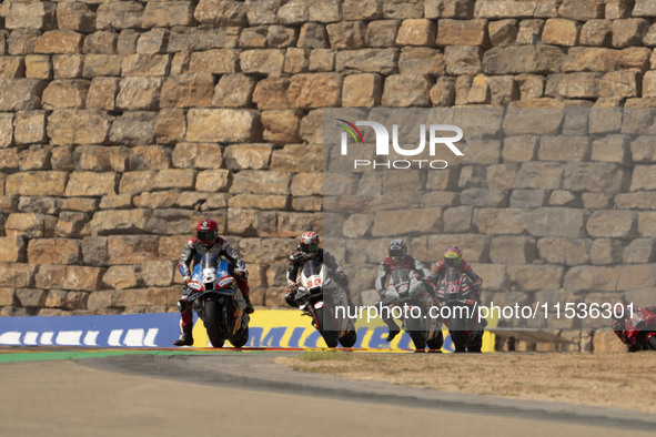 Raul Fernandez (Spa-Aprilia Racing), Takaaki Nakagami (Gia-Honda LCR), Johann Zarco (Fra-Honda LCR), and Aleix Espargaro (Spa-Aprilia Racing...