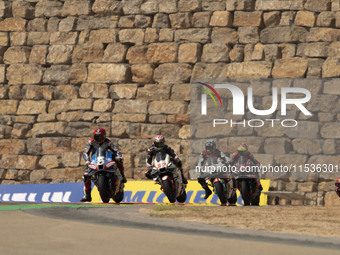 Raul Fernandez (Spa-Aprilia Racing), Takaaki Nakagami (Gia-Honda LCR), Johann Zarco (Fra-Honda LCR), and Aleix Espargaro (Spa-Aprilia Racing...