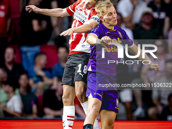 PSV player Olivier Boscagli and Go Ahead Eagles player Finn Stokkers during the match PSV vs. Go Ahead Eagles at the Philips Stadium for the...