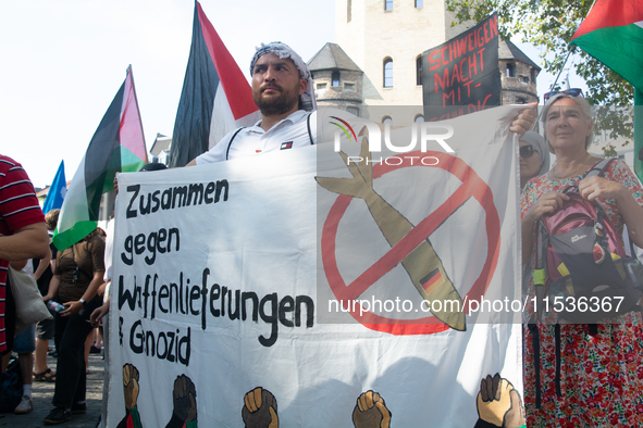 A few hundred people take part in an anti-war demonstration against government policy toward the war and demand peace in Cologne, Germany, o...