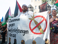 A few hundred people take part in an anti-war demonstration against government policy toward the war and demand peace in Cologne, Germany, o...