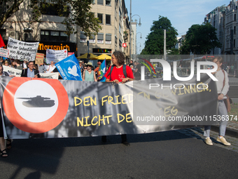 A few hundred people take part in an anti-war demonstration against government policy toward the war and demand peace in Cologne, Germany, o...