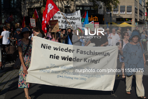 A few hundred people take part in an anti-war demonstration against government policy toward the war and demand peace in Cologne, Germany, o...