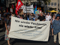 A few hundred people take part in an anti-war demonstration against government policy toward the war and demand peace in Cologne, Germany, o...