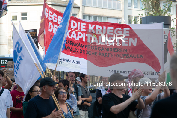 A few hundred people take part in an anti-war demonstration against government policy toward the war and demand peace in Cologne, Germany, o...