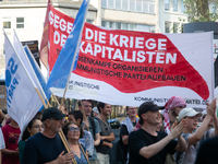 A few hundred people take part in an anti-war demonstration against government policy toward the war and demand peace in Cologne, Germany, o...