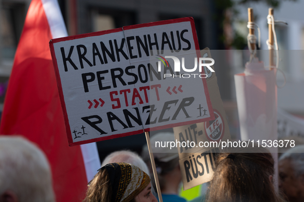 A few hundred people take part in an anti-war demonstration against government policy toward the war and demand peace in Cologne, Germany, o...