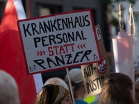 A few hundred people take part in an anti-war demonstration against government policy toward the war and demand peace in Cologne, Germany, o...